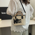 The Mira Woven Bucket Bag